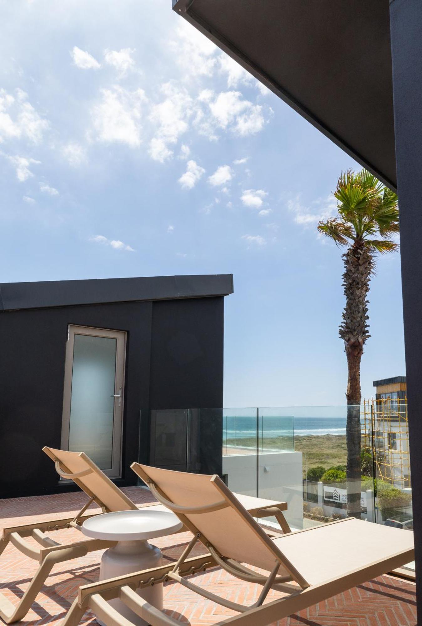 Ocean 9 - Sunset Beachfront Residency